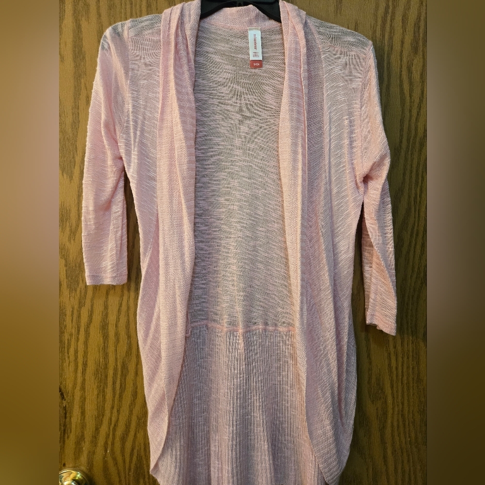 Pretty light pink, sheer, open front cardigan with 3/4 sleeves. Size small.